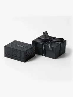 Anillo abierto de oro blanco de 18K con zafiro y diamante