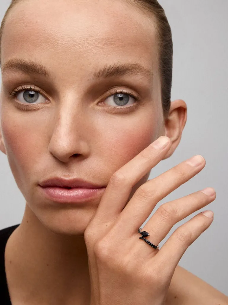 Anillo abierto de plata 925 con 19 espinelas en talla pera y brillante
