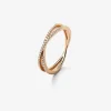 Anillo cruzado de oro rosa de 18K con 40 diamantes en talla brillante con un total de 0,12 cts