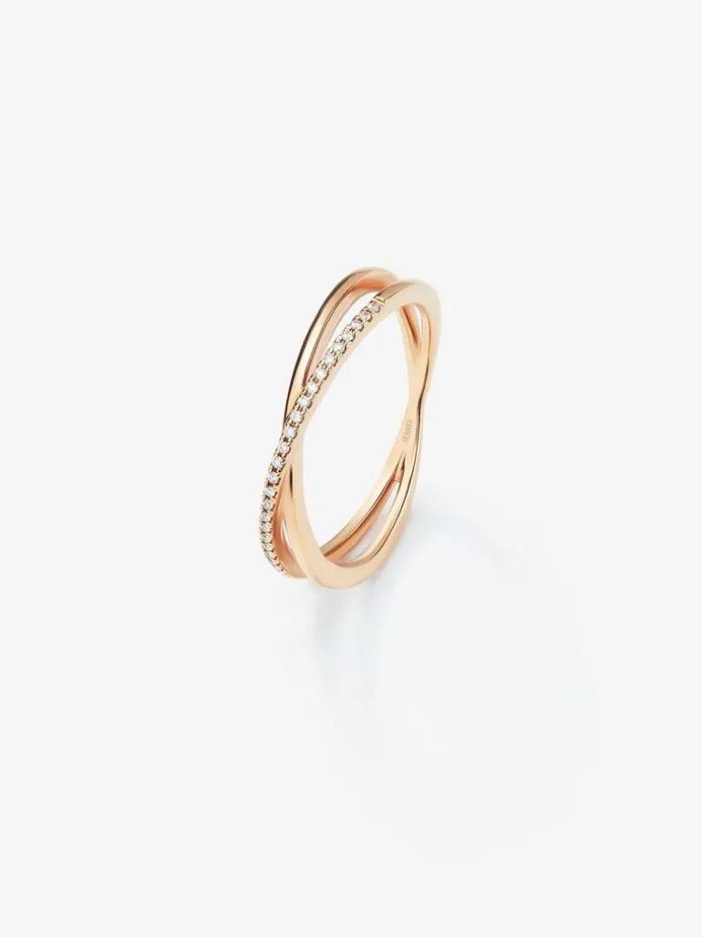 Anillo cruzado de oro rosa de 18K con 24 diamantes blancos en talla brillante con un total de 0,07 cts
