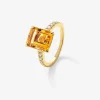 Anillo de oro amarillo de 18K con cuarzo citrino en talla radiant de 1,2 cts y 18 diamantes en talla brillante con un total de 0,18 cts