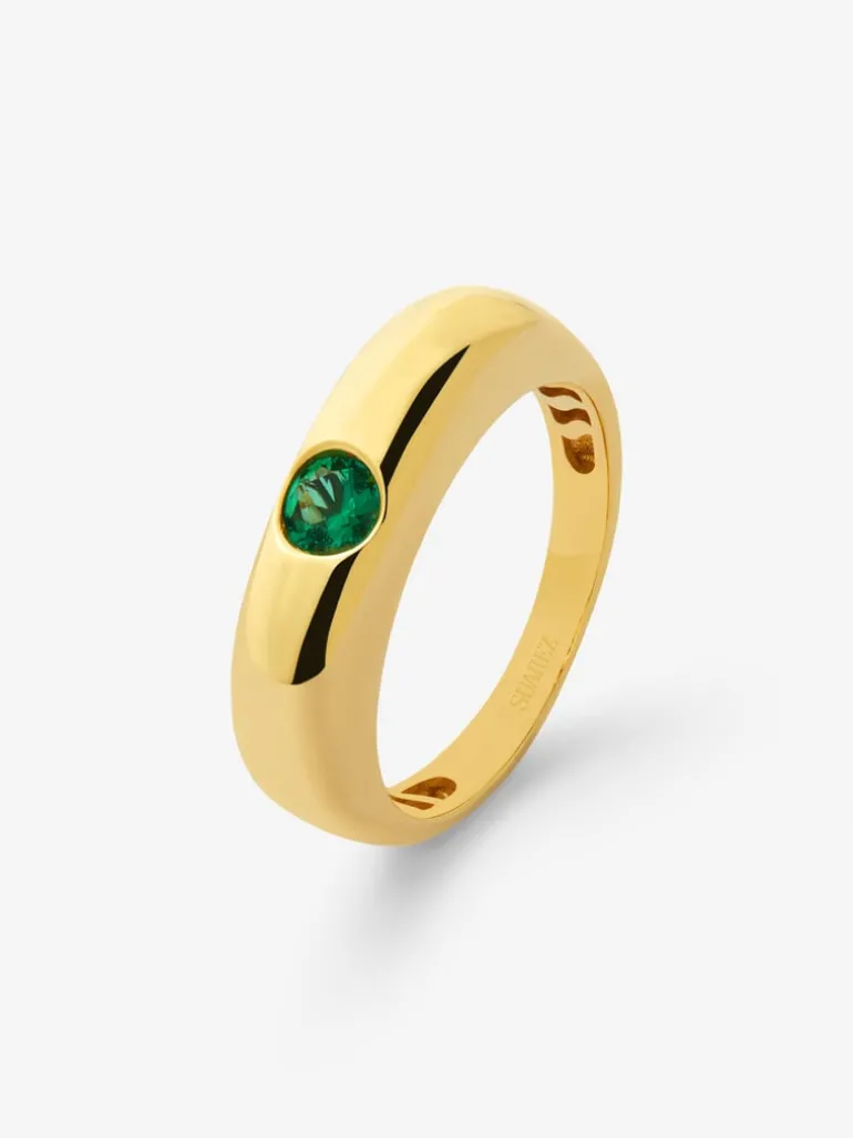Anillo de oro amarillo de 18K con esmeralda en talla brillante de 0,25 cts