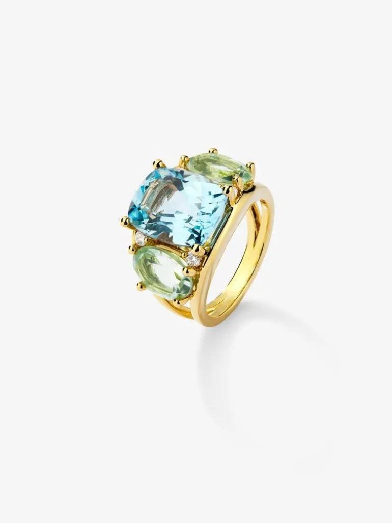 Anillo de oro amarillo de 18K con topacio azul sky en talla cushion de 5,5 cts, amatistas verdes en talla oval de 4,65 cts y diamantes blancos en talla brillante de 0,15 cts