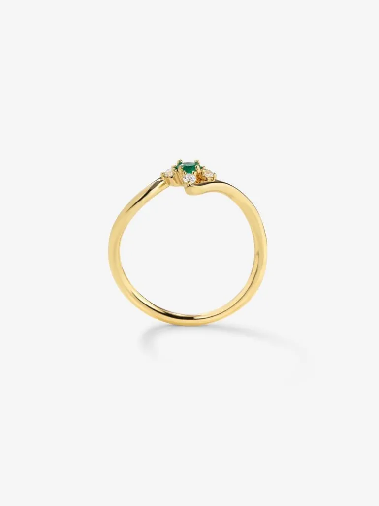 Anillo de oro amarillo de 18K con esmeralda verde en talla brillante de 0,088 cts y 4 diamantes en talla brillante con un total de 0,08 cts