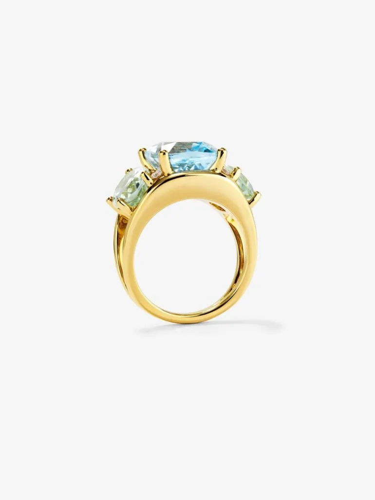 Anillo de oro amarillo de 18K con topacio azul sky en talla cushion de 5,5 cts, amatistas verdes en talla oval de 4,65 cts y diamantes blancos en talla brillante de 0,15 cts