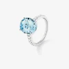 Anillo de oro blanco de 18K con topacio azul sky en talla oval de 5,8 cts y 12 diamantes en talla brillante con un total de 0,3 cts