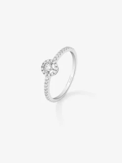 Anillo de oro blanco de 18K con diamante central en talla brillante en talla brillante de 0,06 cts y orla y brazo de 33 diamantes en talla brillante con un total de 0,18 cts