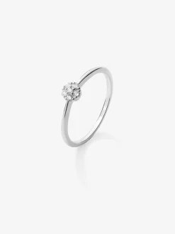 Anillo de oro blanco de 18K con roseta de 15 diamantes en talla brillante con un total de 0,09 cts