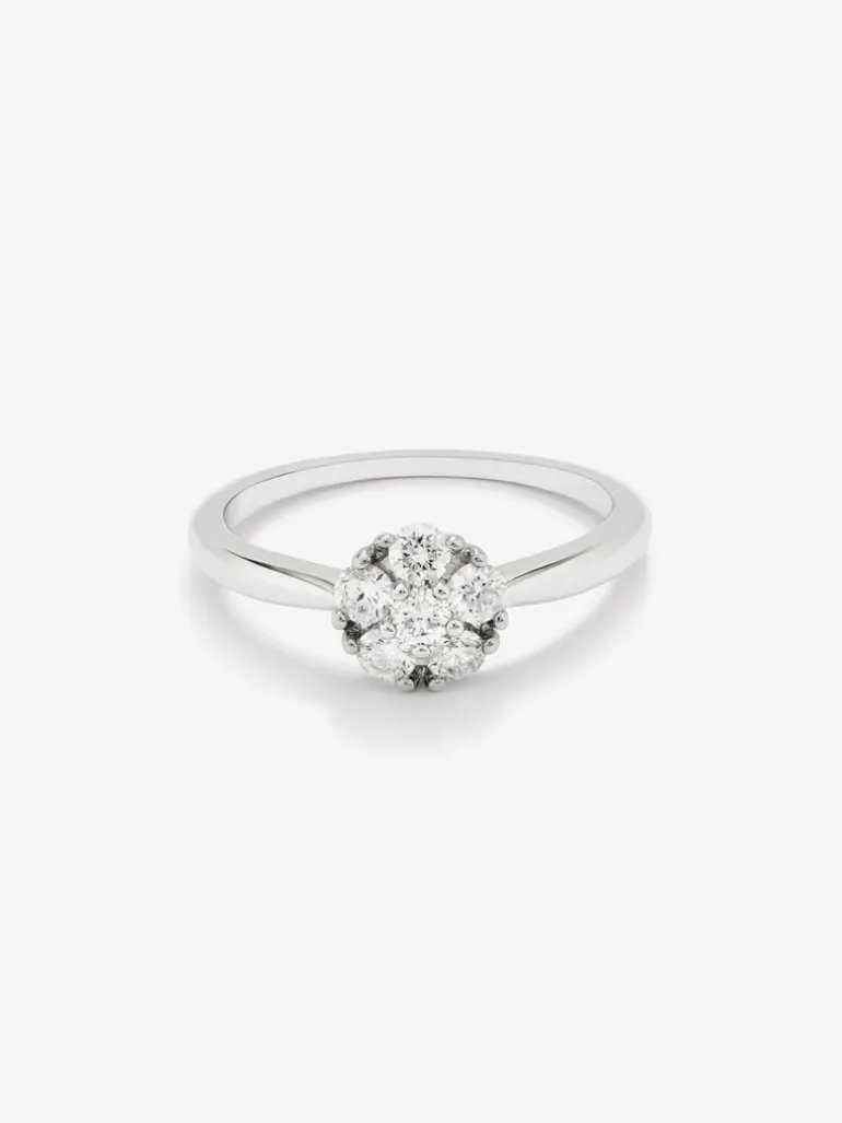 Anillo de oro blanco de 18K con orla de 6 diamantes en talla brillante con un total de 0,4 cts