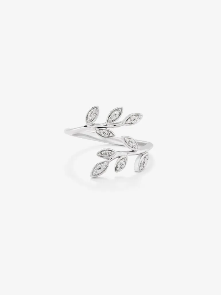 Anillo de oro blanco de 18K con 18 diamantes en talla brillante con un total de 0,07 cts y forma de hojas