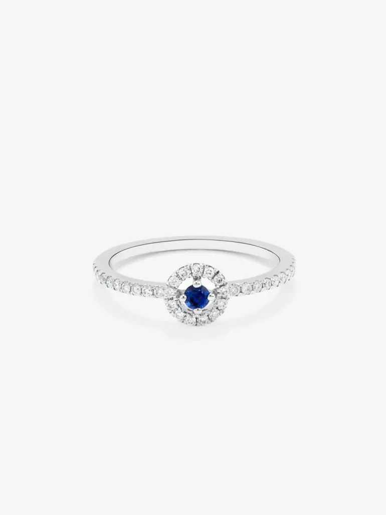 Anillo de oro blanco de 18K con 33 diamantes en talla brillante de con un total 0,18 cts y zafiro azul en talla brillante con un total de 0,08 cts