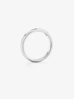 Anillo de oro blanco de 18K con 3 diamantes en talla brillante con un total de 0,09 cts