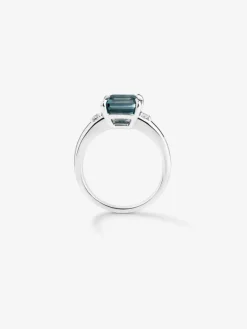 Anillo de plata 925 con topacio azul london en talla esmeralda de 3,74 cts y 2 diamantes en talla brillante con un total de 0,09 cts