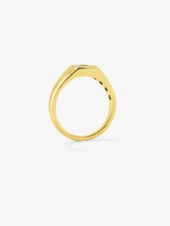 Anillo de sello pequeño de oro amarillo de 18K con malaquita verde de 0,2 cts y diamante en talla brillante de 0,01 cts