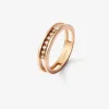Anillo doble de oro rosa de 18K con 7 diamantes en talla brillante con un total de 0,1 cts
