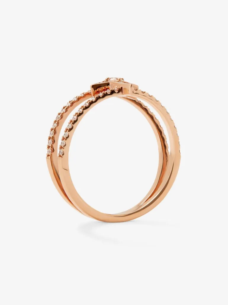 Anillo doble de oro rosa de 18K con estrella y 49 diamantes en talla brillante con un total de 0,29 cts