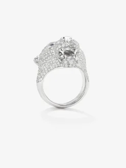 Anillo puma de oro blanco de 18kt con diamantes y zafiros azules
