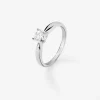 Anillo solitario de compromiso de oro blanco de 18K con diamantes