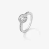 Anillo solitario de compromiso de oro blanco de 18K con diamantes