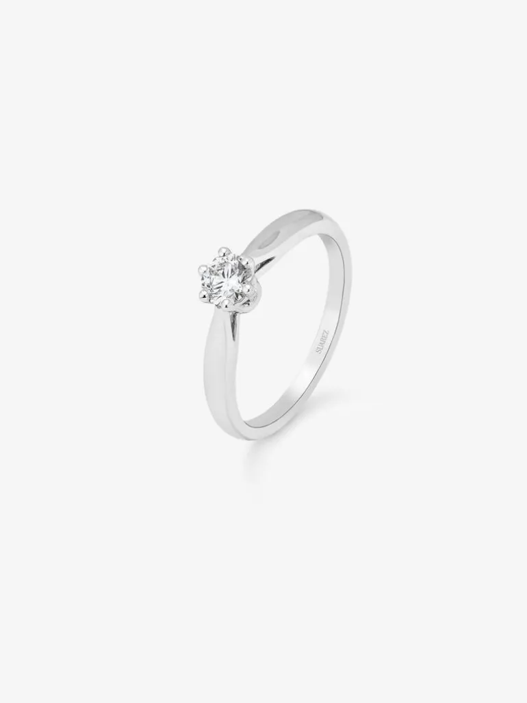 Anillo solitario de compromiso de oro blanco de 18K con diamante central de 0,25 quilates