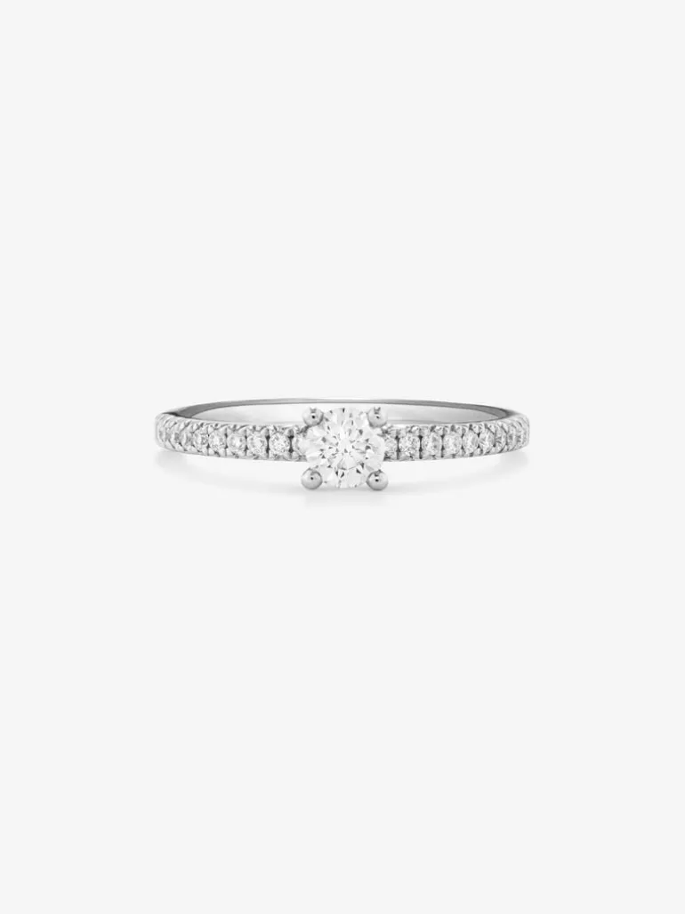 Anillo solitario de compromiso de oro blanco de 18K con diamantes