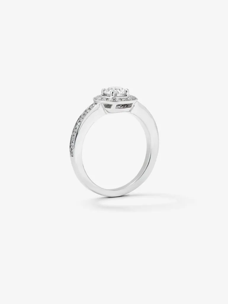Anillo solitario de compromiso de oro blanco de 18K con diamantes