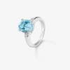Anillo tresillo de plata 925 con topacio azul sky en talla oval de 3,78 cts y 2 diamantes en talla brillante con un total de 0,11 cts
