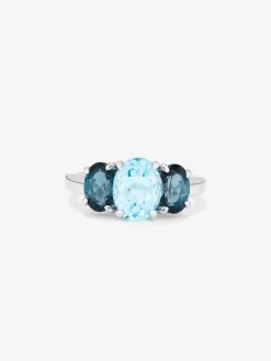 Anillo tresillo de plata 925 con un topacio azul sky en talla oval de 2,31 cts y 2 topacios azul london en talla oval con un total de 1,71 cts