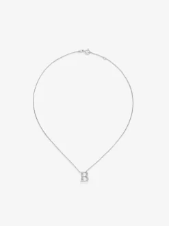 Colgante cadena con inicial de oro blanco de 18K y diamantes