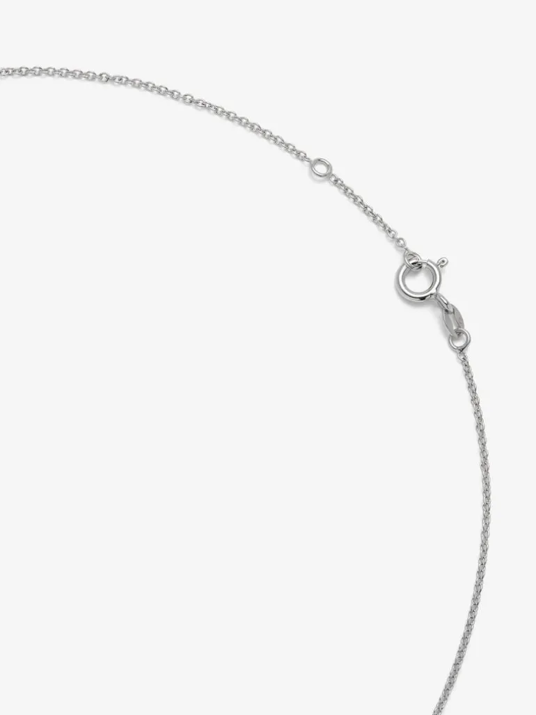 Colgante cadena cruz de oro blanco de 18K con diamantes