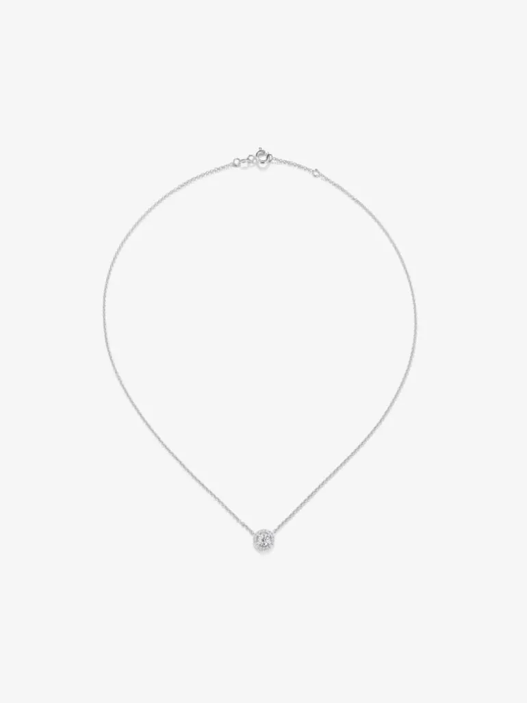 Colgante cadena de oro blanco de 18K con diamante solitario y orla de diamantes