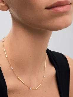 Colgante con barras de oro amarillo de 18K y diamantes en talla brillante con un total de 0,17 cts