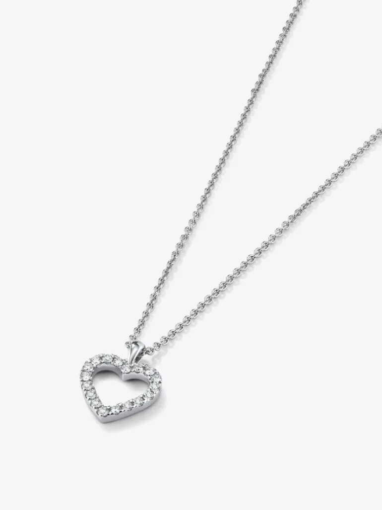 Colgante corazón de oro blanco de 18kt con diamantes de 0,22cts