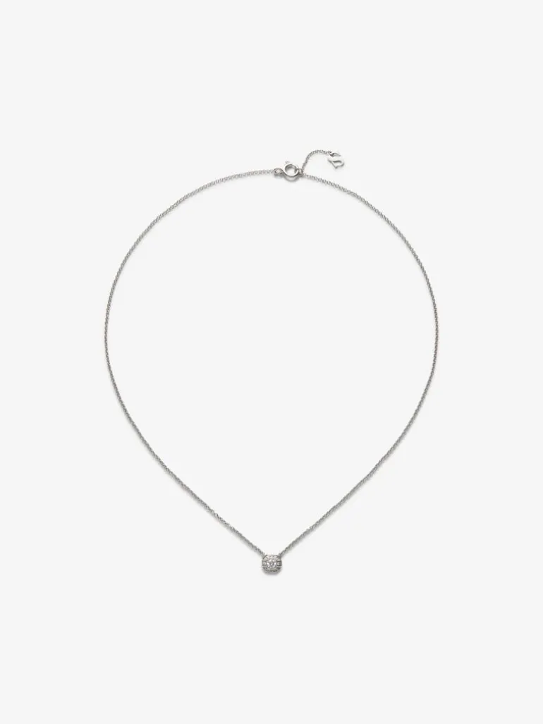 Colgante de oro blanco de 18K con diamante central en talla brillante de 0,1 cts y 12 diamantes en talla brillante con un total de 0,15 cts