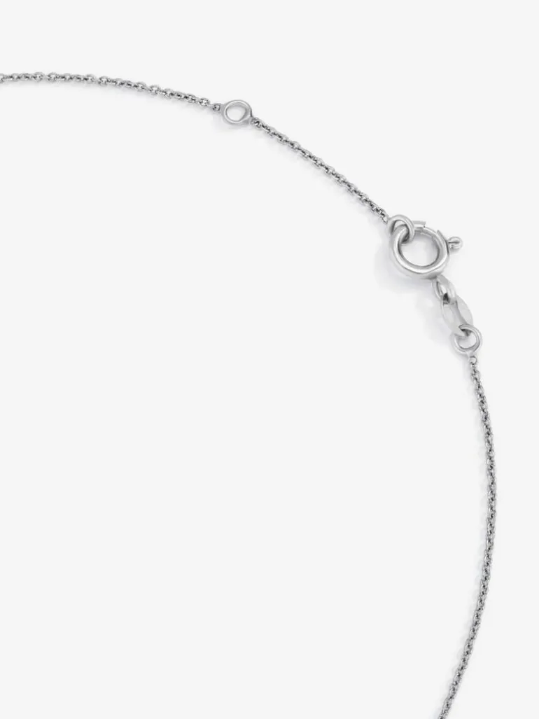 Colgante de oro blanco de 18K con topacio azul london de 0,57 cts y diamantes 0,13 cts