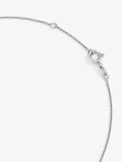 Colgante de oro blanco de 18K con una amatista verde en talla brillante de 0,44 cts y 12 diamantes en talla brillante con un total de 0,13 cts