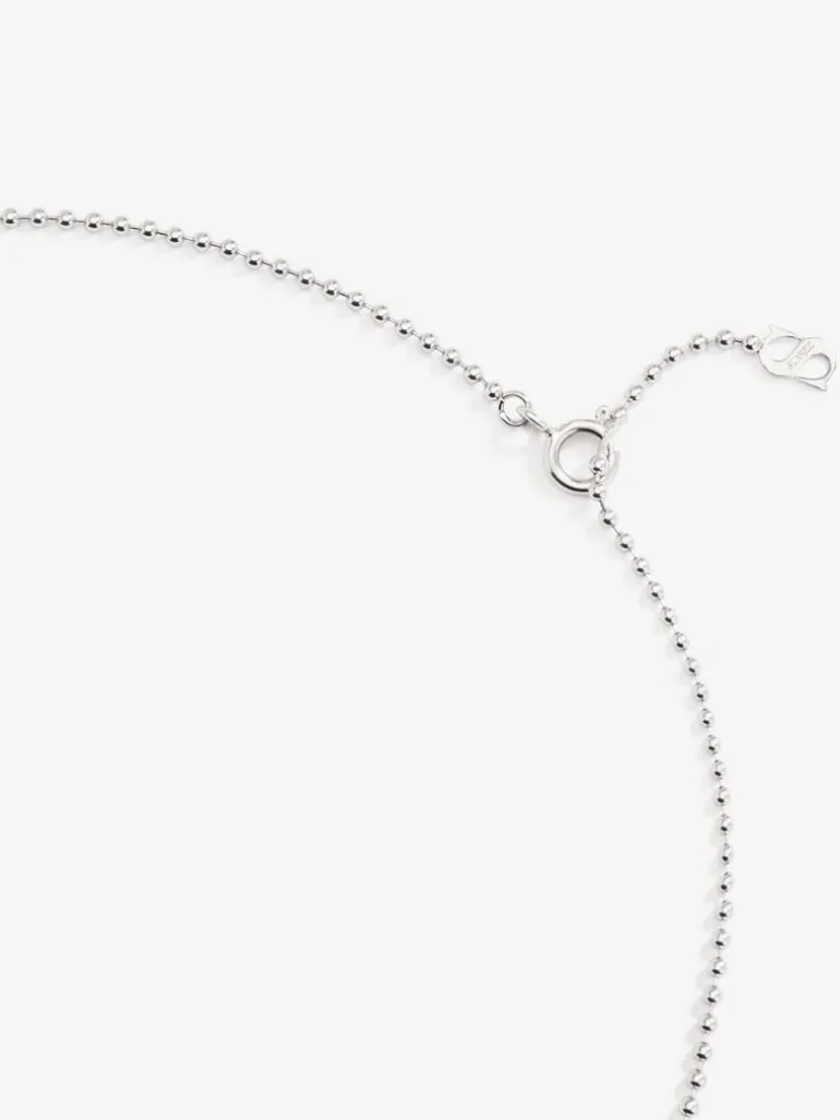 Colgante de oro blanco de 18K con 3 diamantes en talla brillante con un total de 0,18 cts