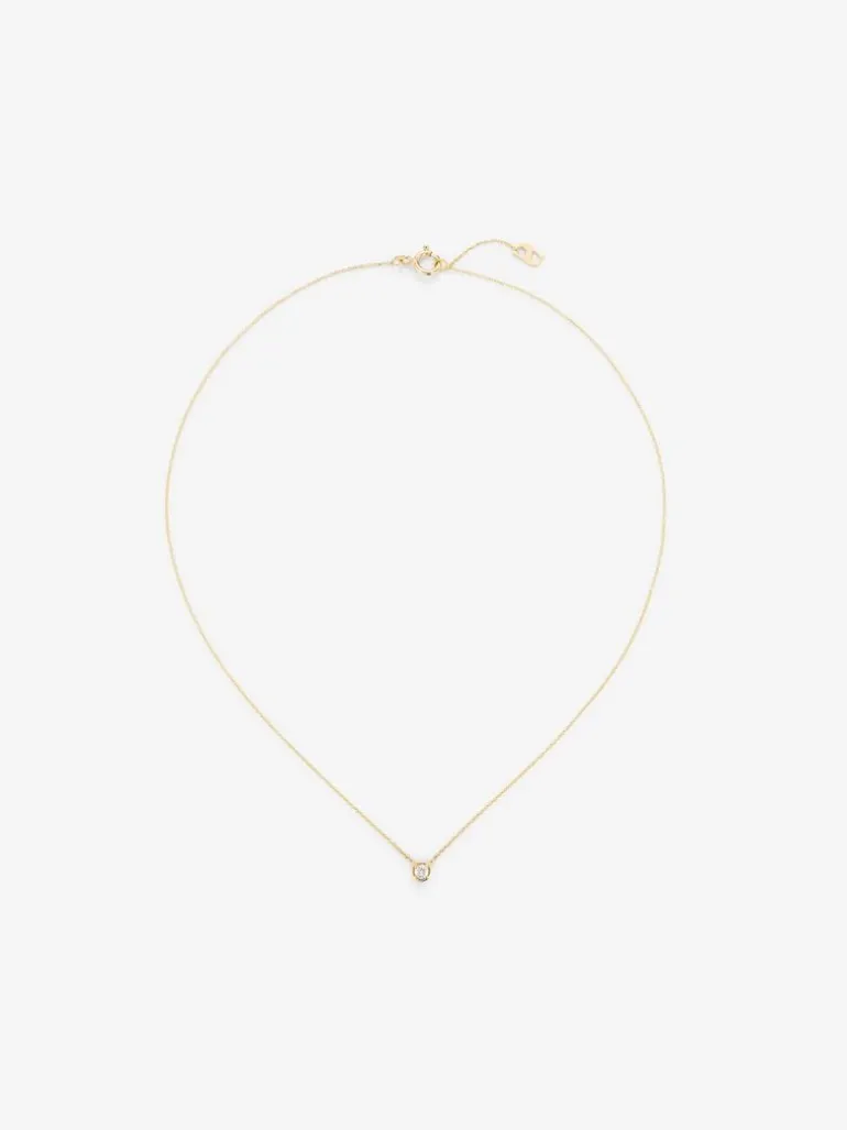 Colgante solitario de oro amarillo de 18K con diamante blanco en talla brillante de 0,05 cts