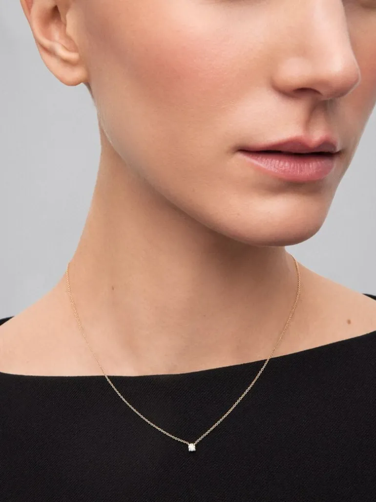 Colgante solitario de oro amarillo de 18K con diamante blanco en talla brillante de 0,1 cts