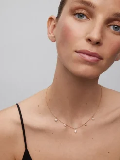 Collar gargantilla con estrellas de oro rosa de 18K con diamantes