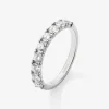 Media alianza de oro blanco de 18K con 9 diamantes en talla brillante con un total de 0,91 cts