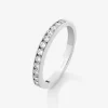 Media alianza de oro blanco de 18K con 16 diamantes en talla brillante con un total de 0,5 cts