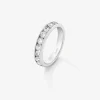 Media alianza de oro blanco de 18K con 10 diamantes en talla brillante con un total de 1,1 cts