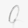 Media alianza de oro blanco de 18K con 16 diamantes en talla brillante con un total de 0,2 cts