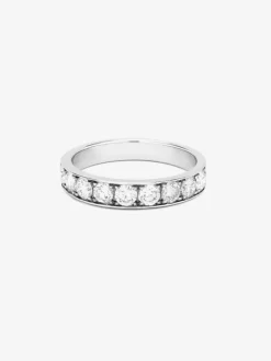 Media alianza de oro blanco de 18K con 8 diamantes en talla brillante con un total de 1,14 cts