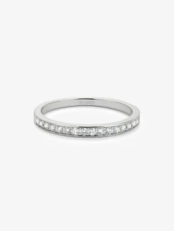 Media alianza de oro blanco de 18K con 18 diamantes en talla brillante con un total de 0,18 cts