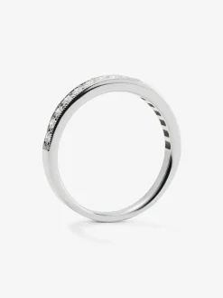Media alianza de oro blanco de 18K con 16 diamantes en talla brillante con un total de 0,29 cts