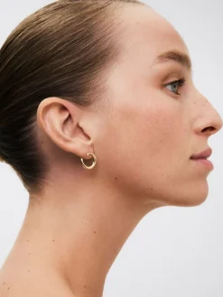 Pendientes aro liso peque&ntilde;o de oro amarillo de 18K con diamante