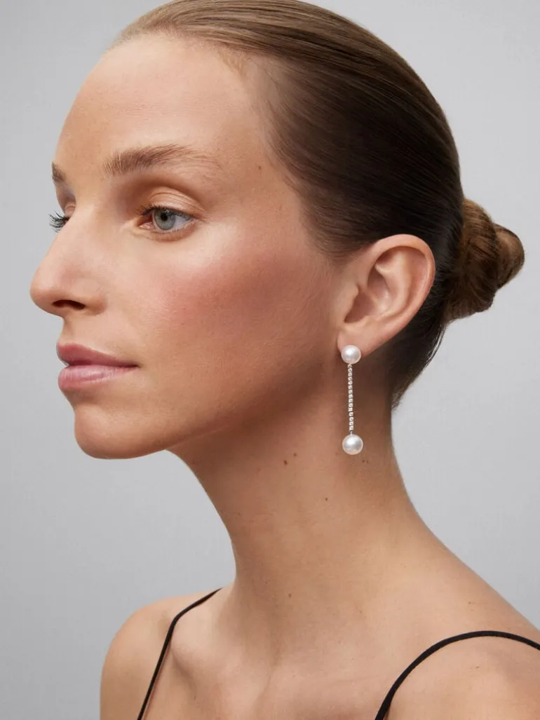 Pendientes colgante largo de oro blanco de 18K con diamante y perla