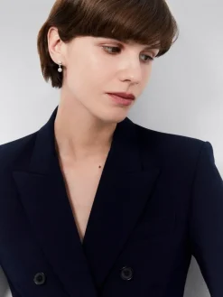 Pendientes de oro blanco de 18K con 2 perlas akoya y 14 diamantes en talla brillante con un total de 0,09 cts